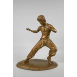 A gilt bronze figure of Bruce Lee, 13" high
