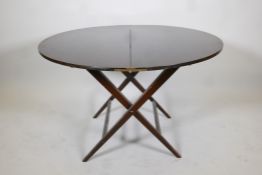 A beechwood coaching table, bears label, Thornton and Herne, Cadogan Place, Pont Street, SW, 40"