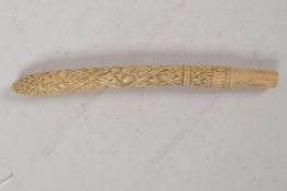 A C19th Chinese Canton carved ivory parasol handle, 8" long