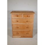 C19th stripped pine chest of two over three drawers, raised on a plinth base, 37" x 20" x 43"