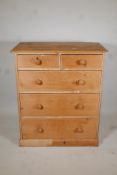 C19th stripped pine chest of two over three drawers, raised on a plinth base, 37" x 20" x 43"