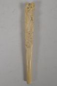 A C19th Japanese carved ivory parasol handle, carved with elephants and monkey. 7" long