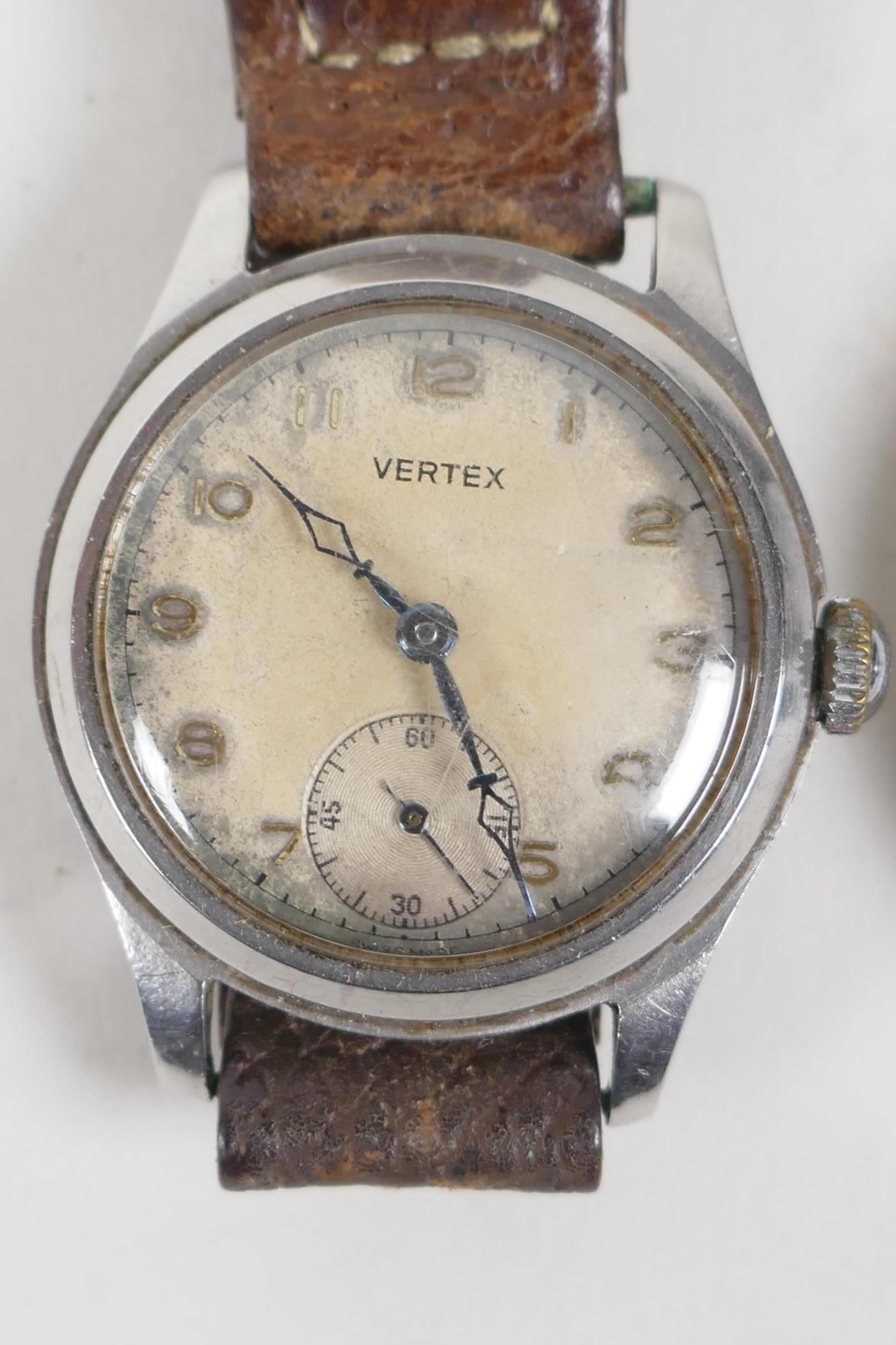 A Swiss made 17 jewel pocket watch movement, with an enamel face and a subsidiary second dial. - Image 2 of 5