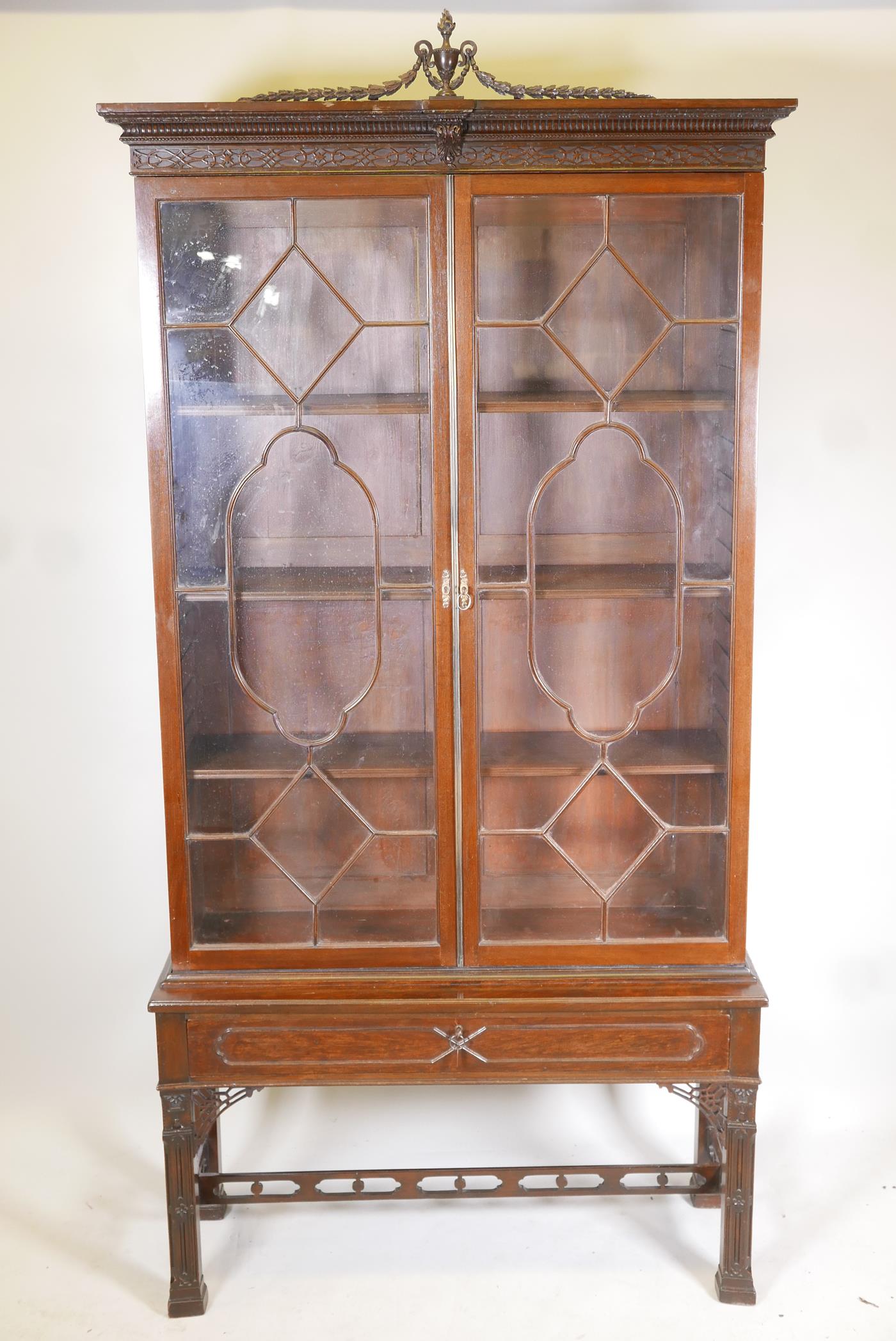 A 19th C Mahogany Chinese Chippendale style display cabinet, the upper section with two astral
