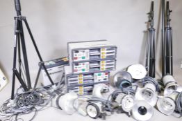 A photographer's studio flash lighting system, five Elinchrom 3000 classic power packs, seven