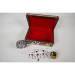 A jewellery box, inlaid with Egyptianesque scenes. Containing a costume necklace & earring set and