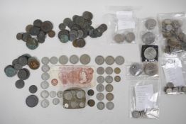 An extensive collection of British coinage to include a coin case containing five George V silver