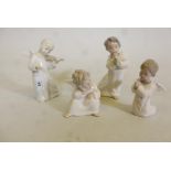A set of four Lladro figures of cherubs, largest 6" high