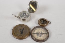 A Novelty brass cased compass, with the details of the Titanic on the cover. Together with a