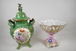 A 19th C European porcelain lidded two handled jar and cover, Painted with flowers raised on four