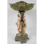 A Royal Dux style amphora tazza, the base modelled as two girls by a tree. 16" high