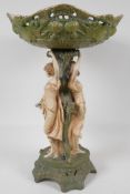 A Royal Dux style amphora tazza, the base modelled as two girls by a tree. 16" high