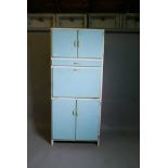 A mid century Beatall Product, painted kitchen cupboard, with two doors and drawer over a fall front