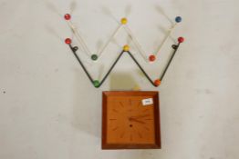 Two mid century "atomic" coat hangers, 19" wide and a vintage Smiths 8 day wall clock