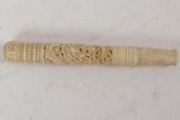 A C19th oriental carved bone parasol handle, carved with dragons. 6" long