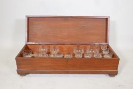 A 19th C mahogany cased "Glass Harp", containing a suite of drinking glasses, adapted to be played