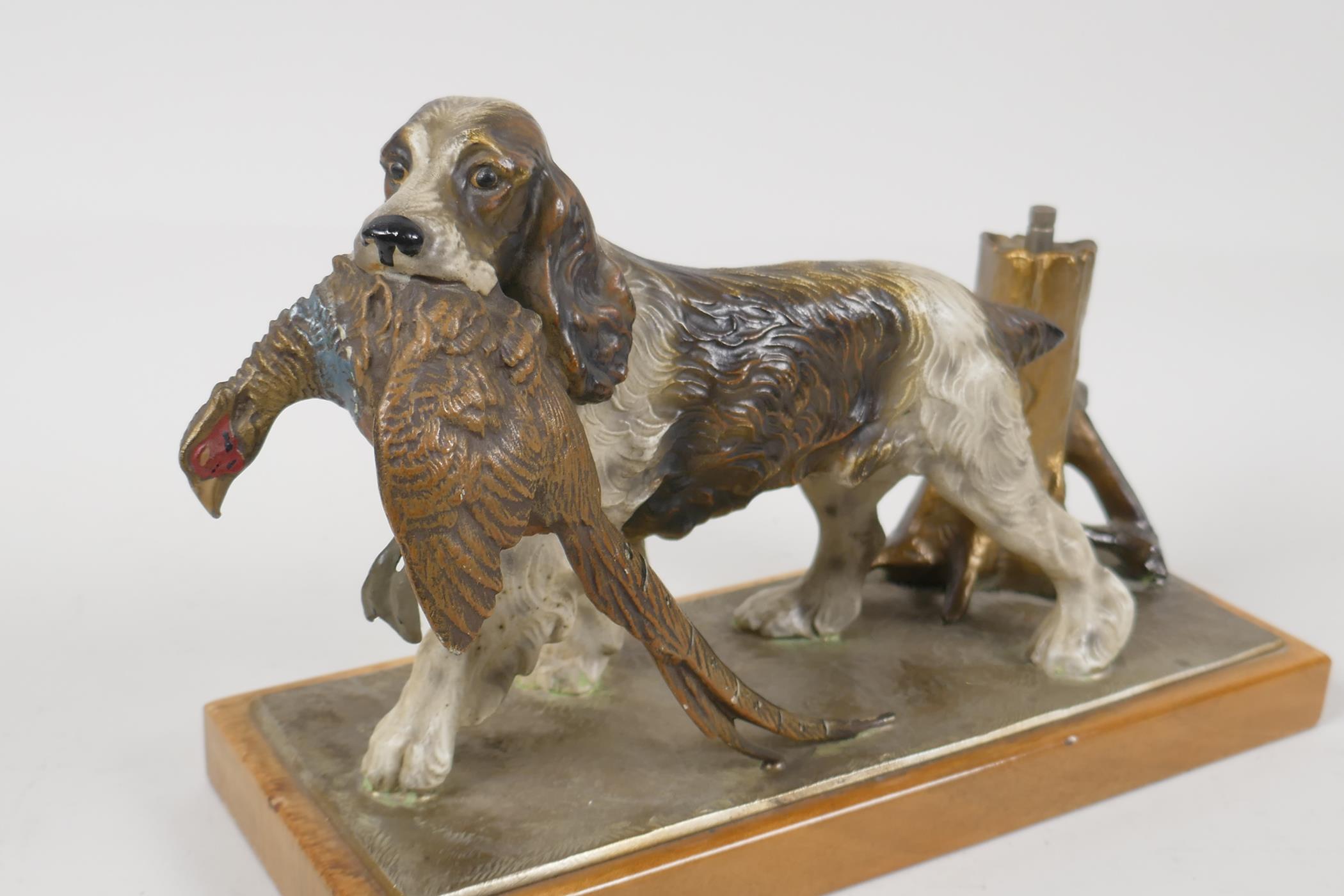 A novelty gold painted metal table lighter, in the form of a gun dog, with pheasant in it's mouth. - Image 3 of 3