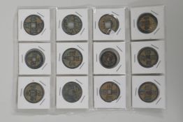 Twelve Chinese facsimile bronze coins/tokens, 1¼" diameter