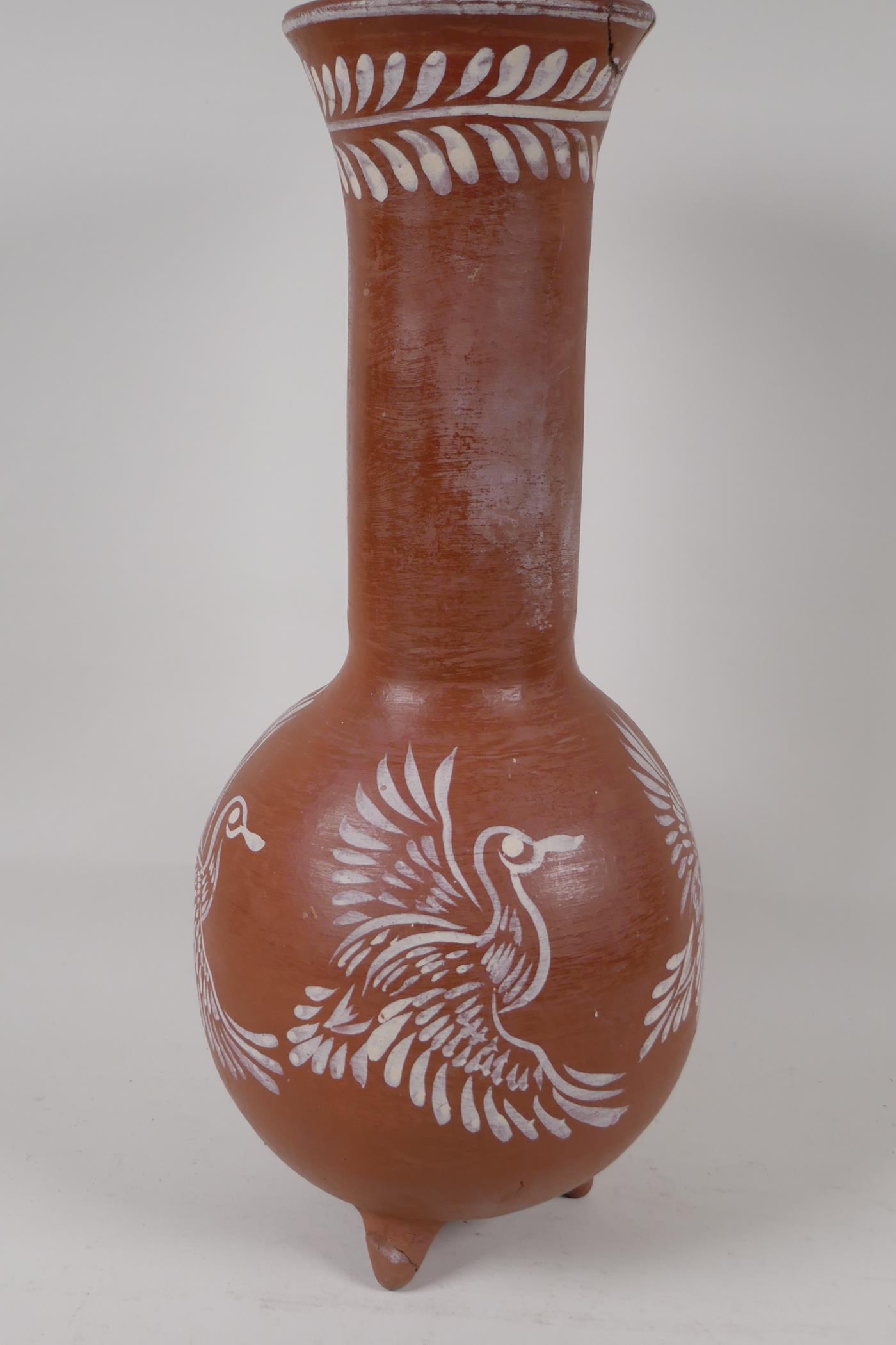 A Mexican terracotta of bulbous form, with long neck and flared rim. With scafito decoration of - Image 2 of 5