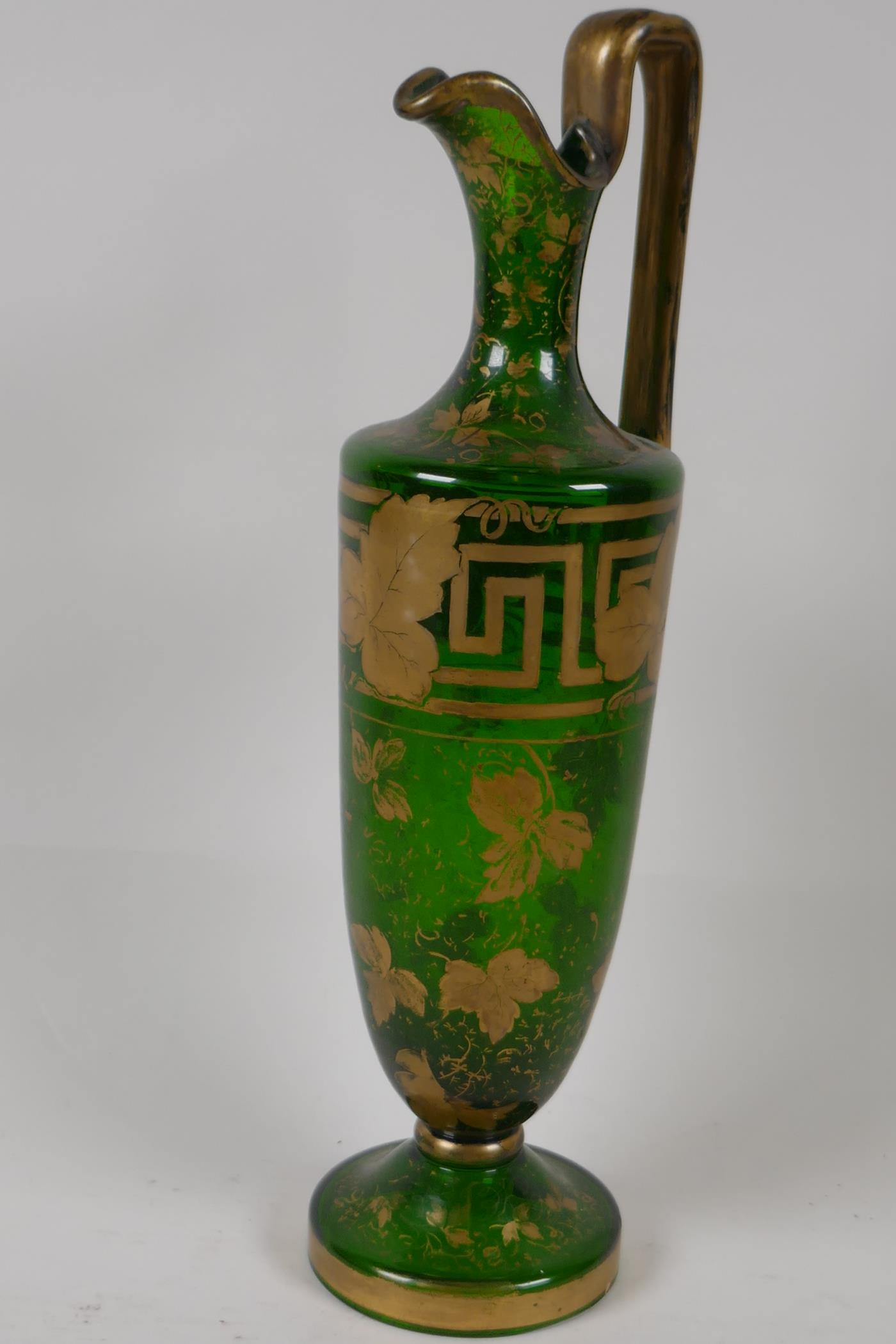 A C19th green glass wine ewer, with vine leaf and Greek key. Gilded decoration, 12¼" - Image 2 of 4