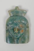 An Egyptian turquoise glazed Faience Shabti head/amulet, 3" x 4½"