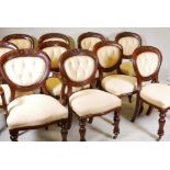 A set of 8+2 Victorian mahogany balloon back dining chairs, with upholstered backs and seats, raised