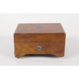An early C20th Swiss figured walnut miniature music box, playing two airs. AF, 4½" x 3"