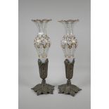 A pair of Bohemian overlaid glass spill vases, with gilt details and decorative metal mounts, AF,