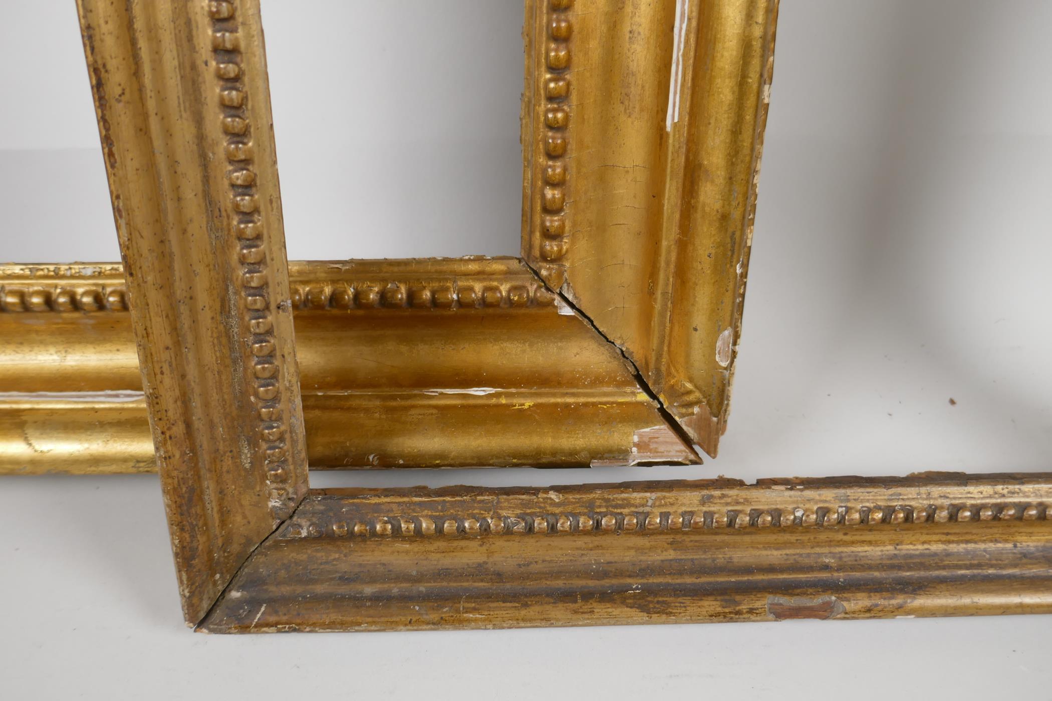 Two early C19th giltwood picture frames, having carved bead decoration. Largest rebate 15" x 10½" - Image 3 of 4