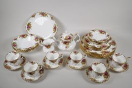 A Royal Albert Old Country Rose part dinner & tea service to include 6 dinner plates, 6 side plates,