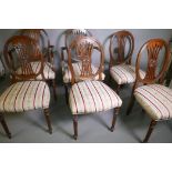 A set of six (four + two) Adam style dining chairs, with pierced splat backs, raised on fluted