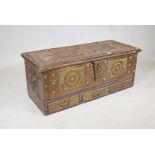 A hardwood Zanzibar chest, with brass drawers and brass studded decoration. 44" x 18" x 18"