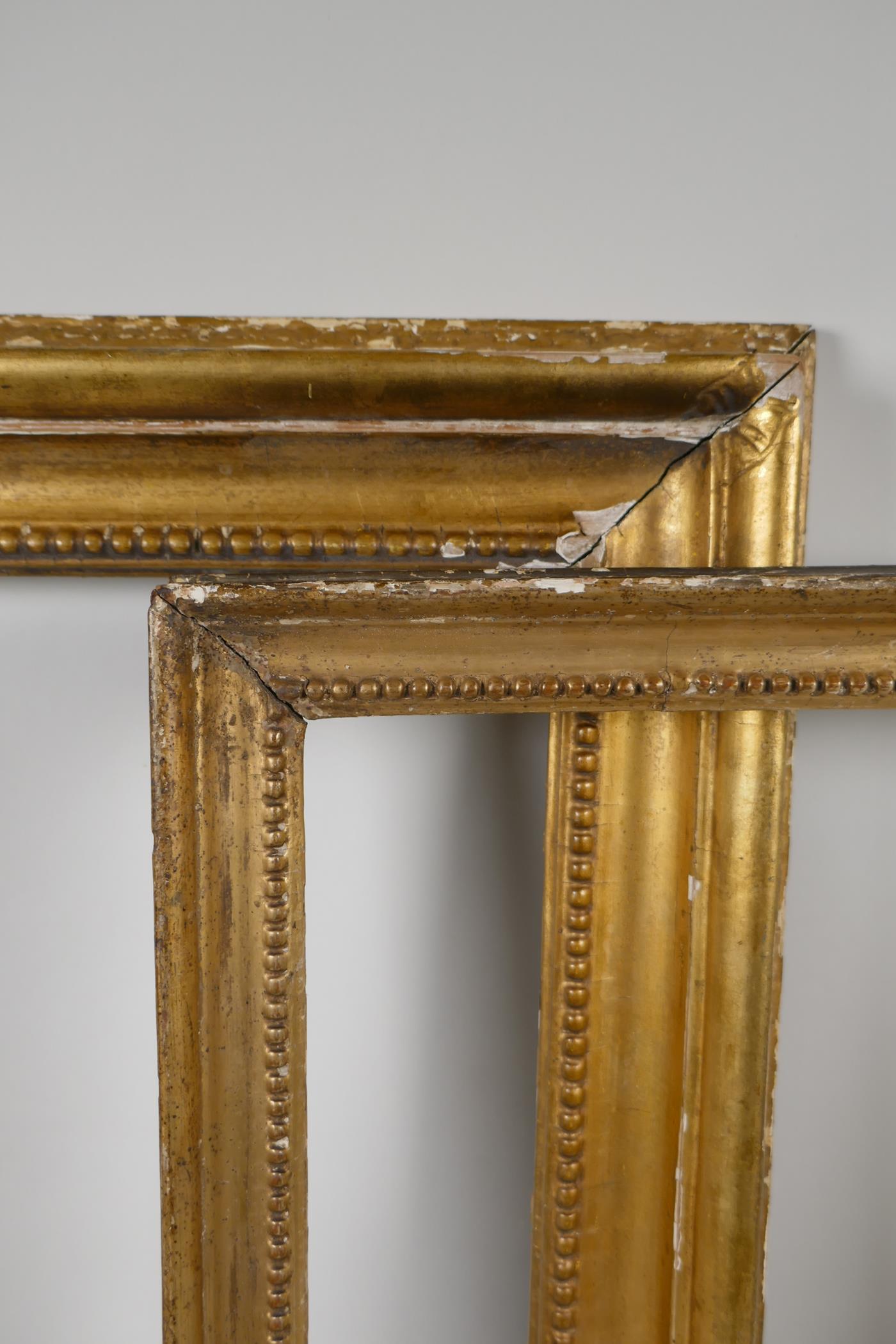 Two early C19th giltwood picture frames, having carved bead decoration. Largest rebate 15" x 10½" - Image 2 of 4