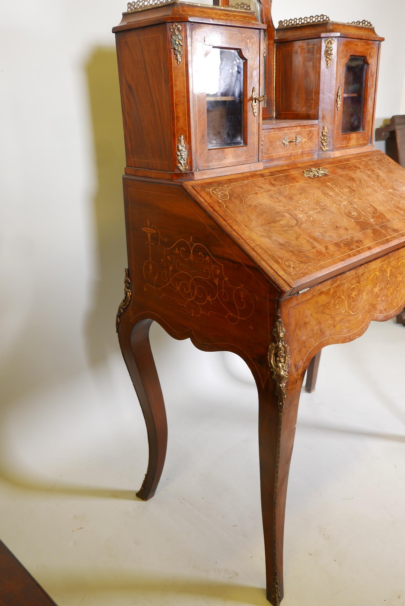 A Victorian inlaid, figured and burr walnut bonne-heure-de jour, with a brass galleried top and - Image 7 of 7