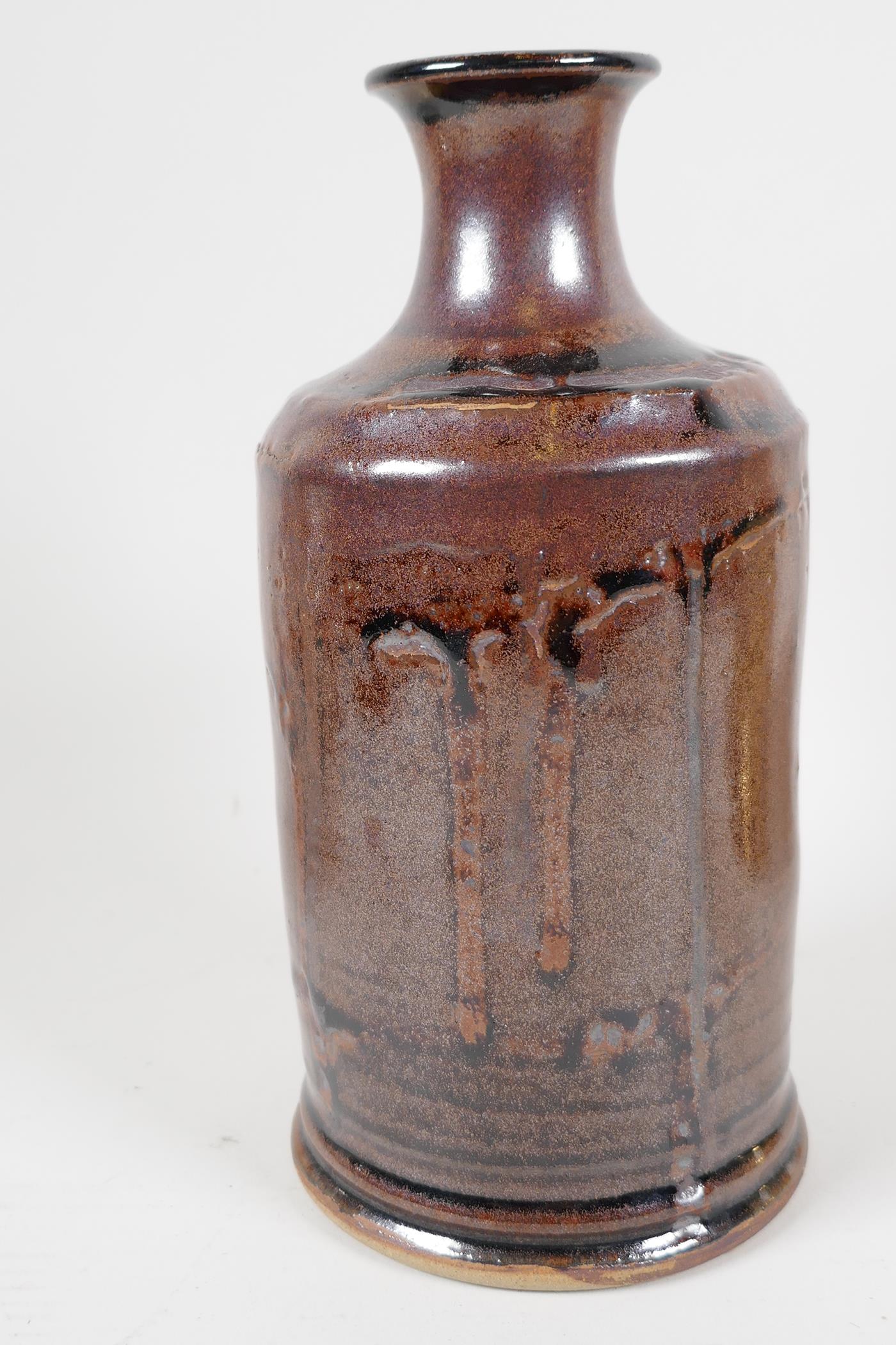 A drip glazed stoneware bottle vase of tubular design with narrow neck, 7½" long - Image 2 of 4