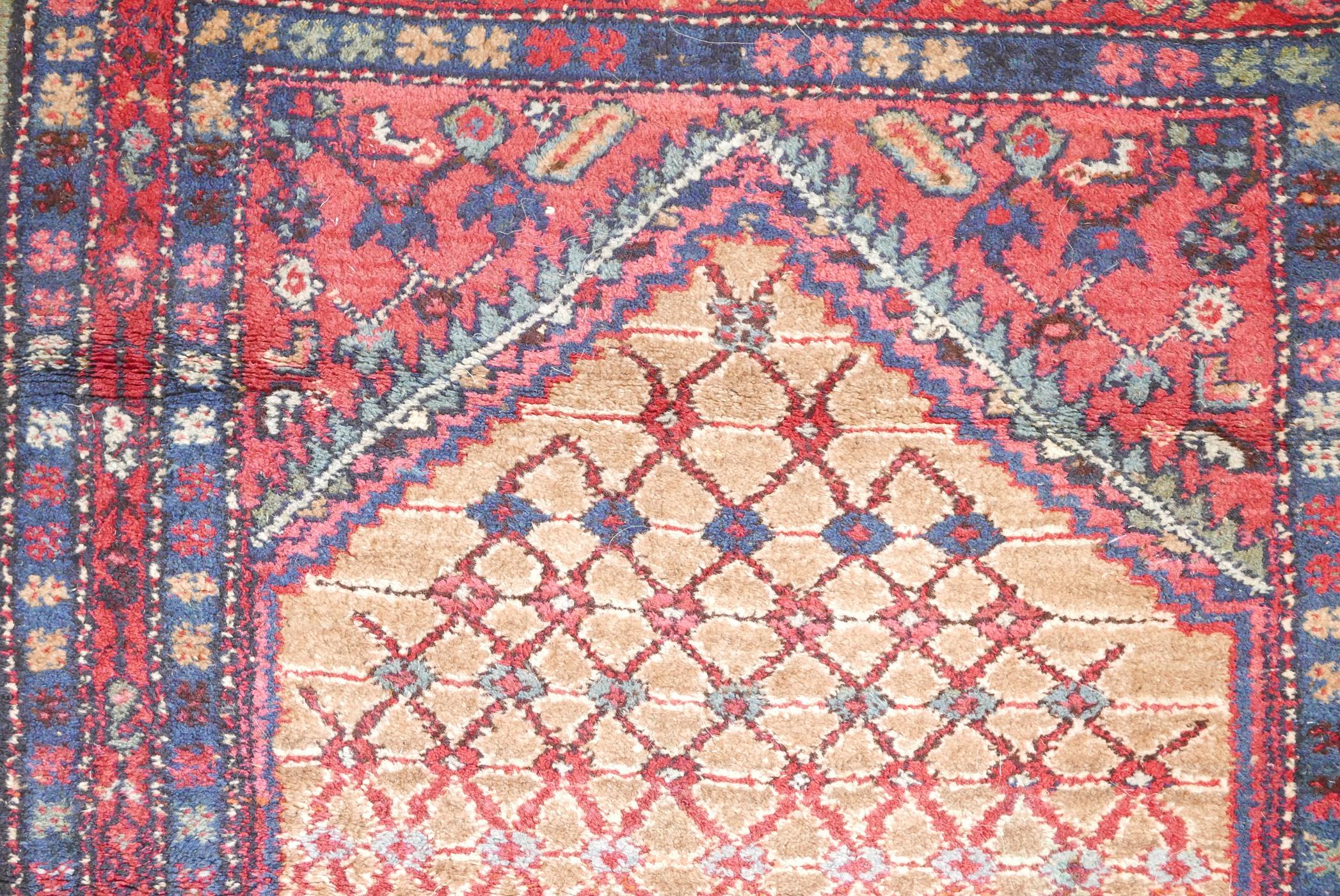 An antique, deep pile, hand woven wool Persian rug. With geometric designs in a central panel & blue - Image 3 of 5