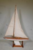 A vintage pond yacht, 36" long x 58" high