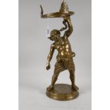 A cast brass centre-piece in the form of Bacchus with a serpent, 16" high