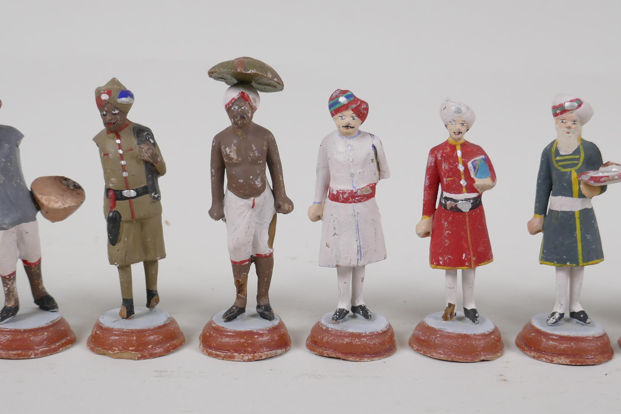 Twelve Indian painted terracotta figures, depicting various professions, AF, largest 3½" - Image 3 of 5