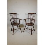 Pair of late C19th/ early C20th comb back beechwood Windsor elbow chairs, with saddle shaped