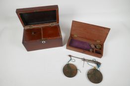 A mahogany cased set of gold scales, 8" long and a small mahogany, two compartment tea caddy