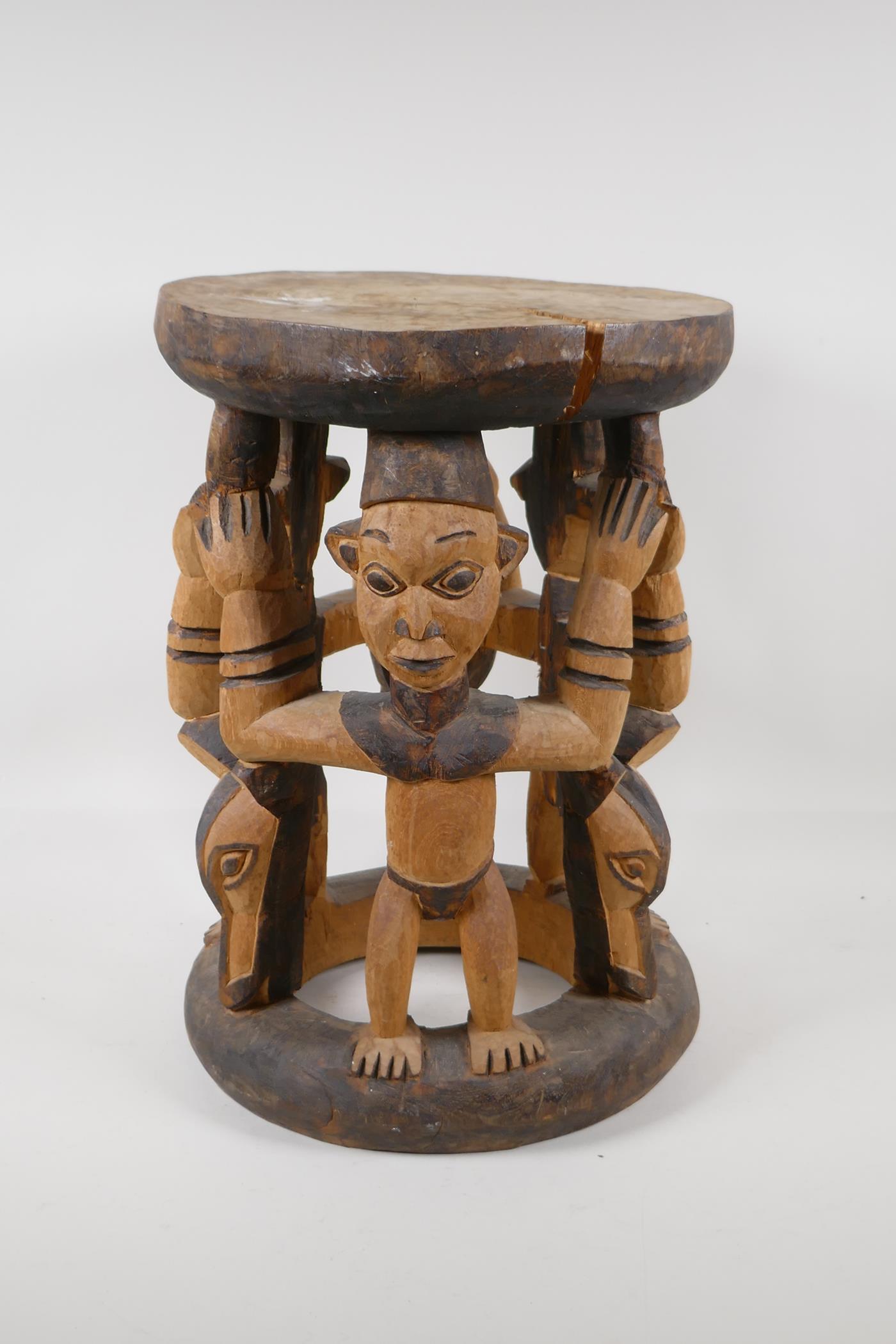 An African carved & stained wood figural stool. 16½" high x 12" diameter - Image 3 of 4