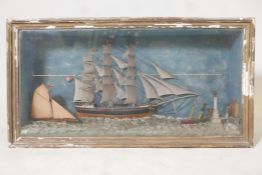 A C19th folk art ship diorama depicting a three masted sailing ship, a cutter and a steam boat off a