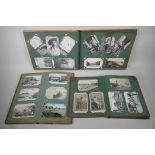 Three albums of C19th & early C20th postcards, including topographical, royalty, sportsmen,