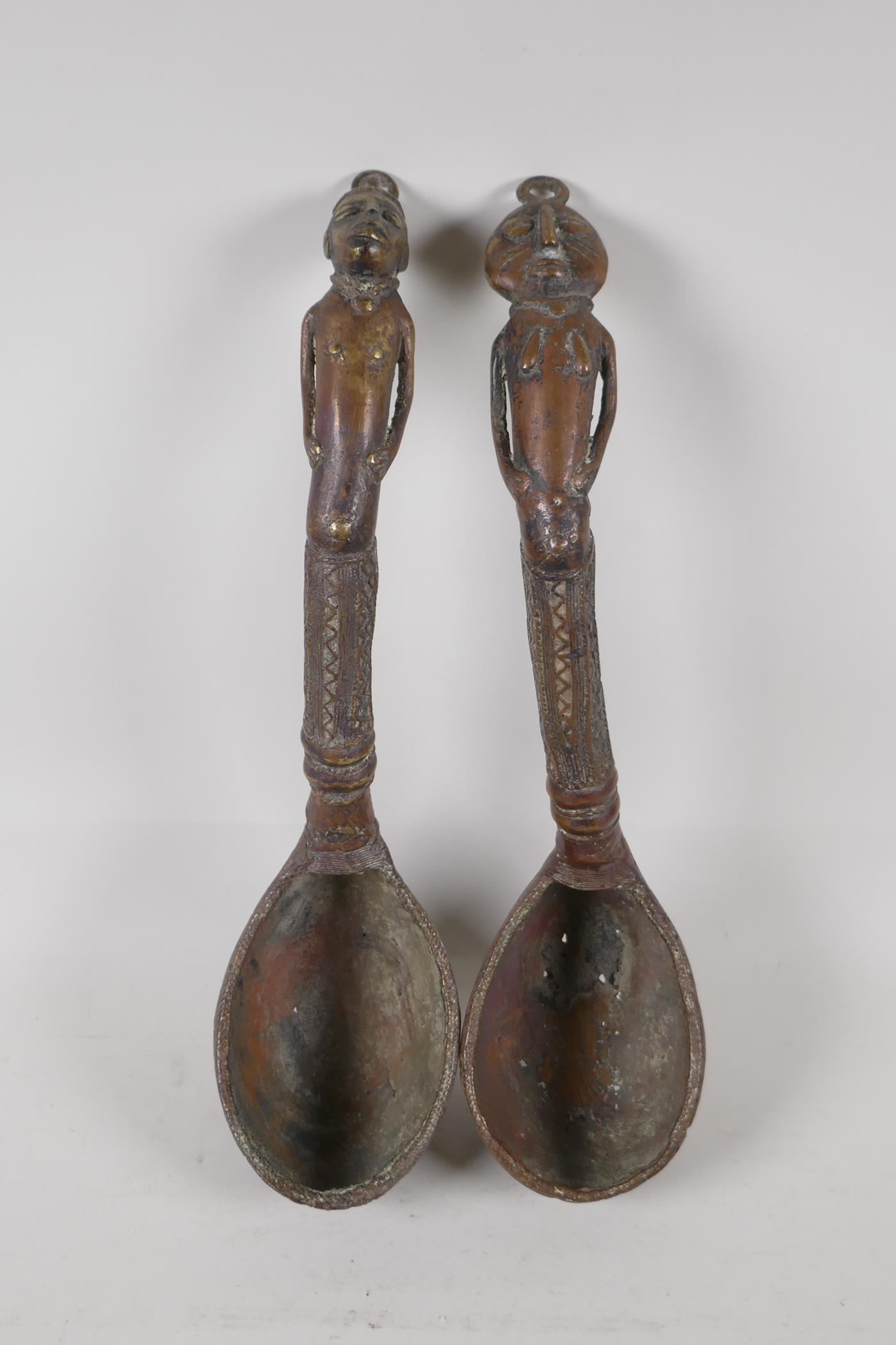 A pair of African brass ladles with figural handles. 15" long - Image 3 of 5