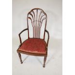 A Georgian mahogany elbow chair, with delicate splat back and turned supports. Seat 20" wide
