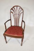A Georgian mahogany elbow chair, with delicate splat back and turned supports. Seat 20" wide