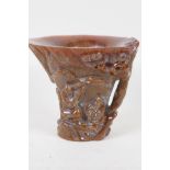 A Chinese faux horn libation cup, decorated with figures. Impressed seal mark to base. 4½" high