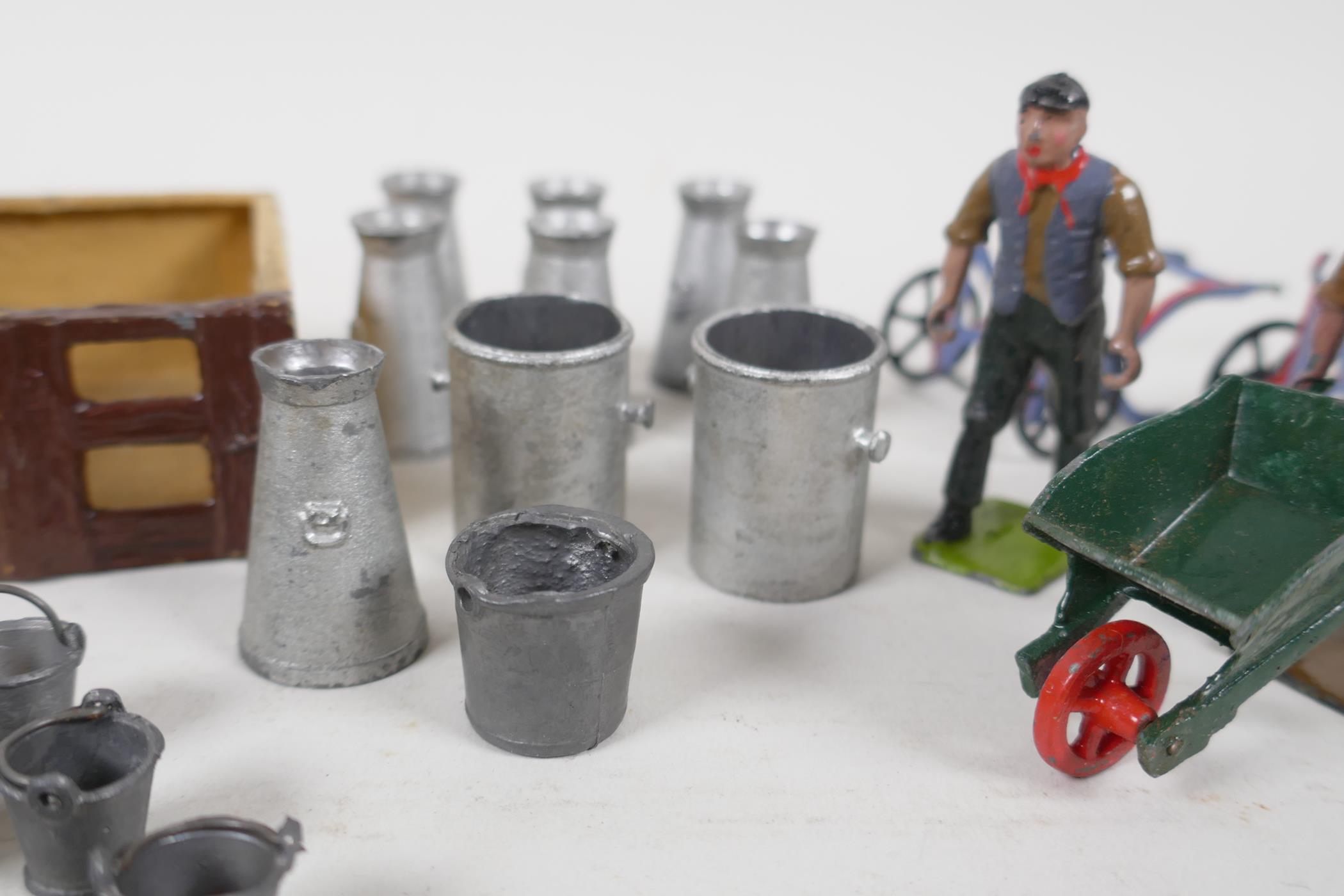 A collection of Britains, painted lead agricultural figures & milk churns, etc. AF - Image 4 of 6