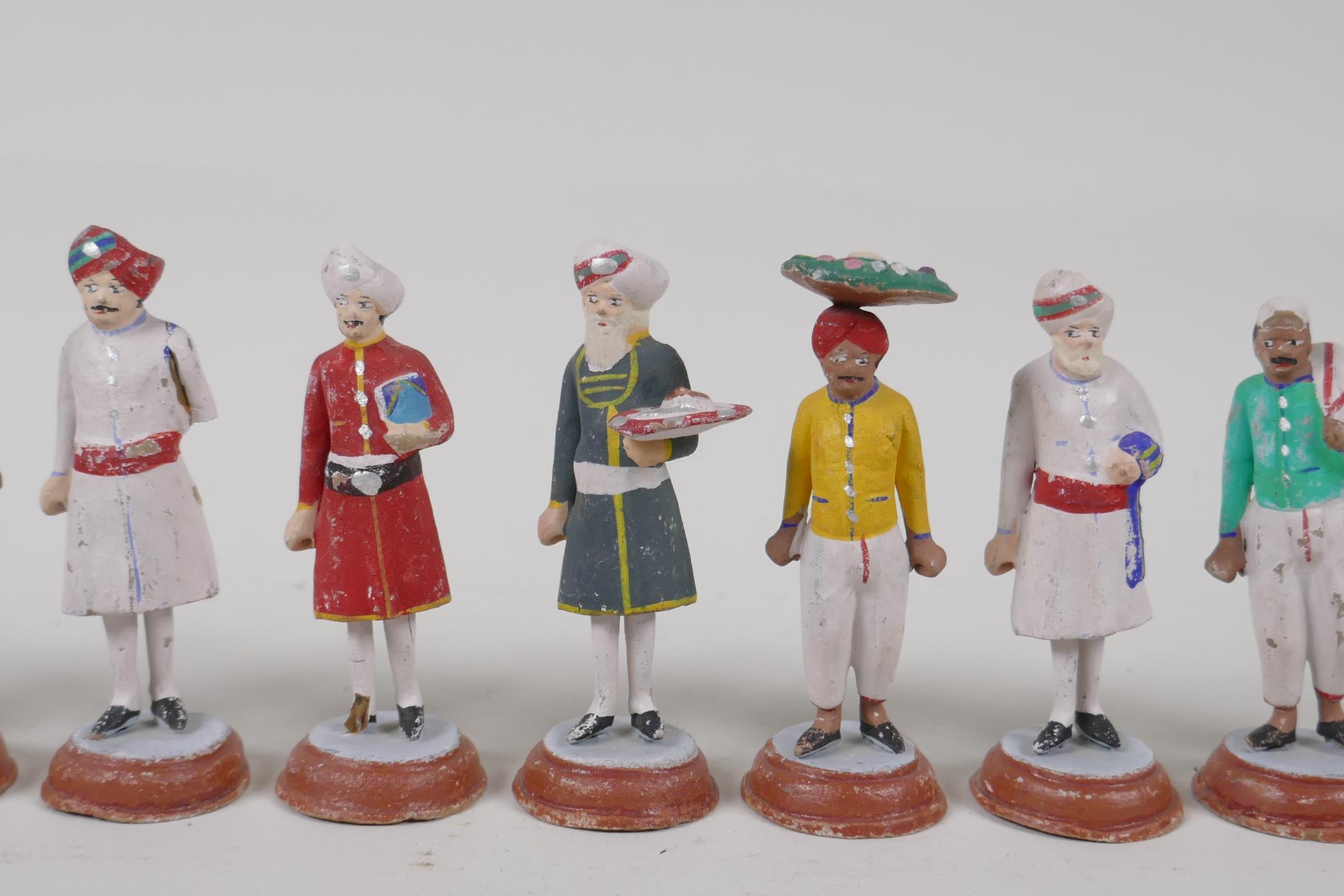 Twelve Indian painted terracotta figures, depicting various professions, AF, largest 3½" - Image 4 of 5